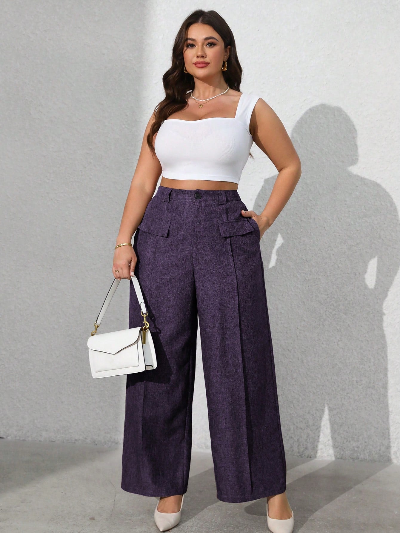 Calça feminina com falsos bolsos plus size Regina
