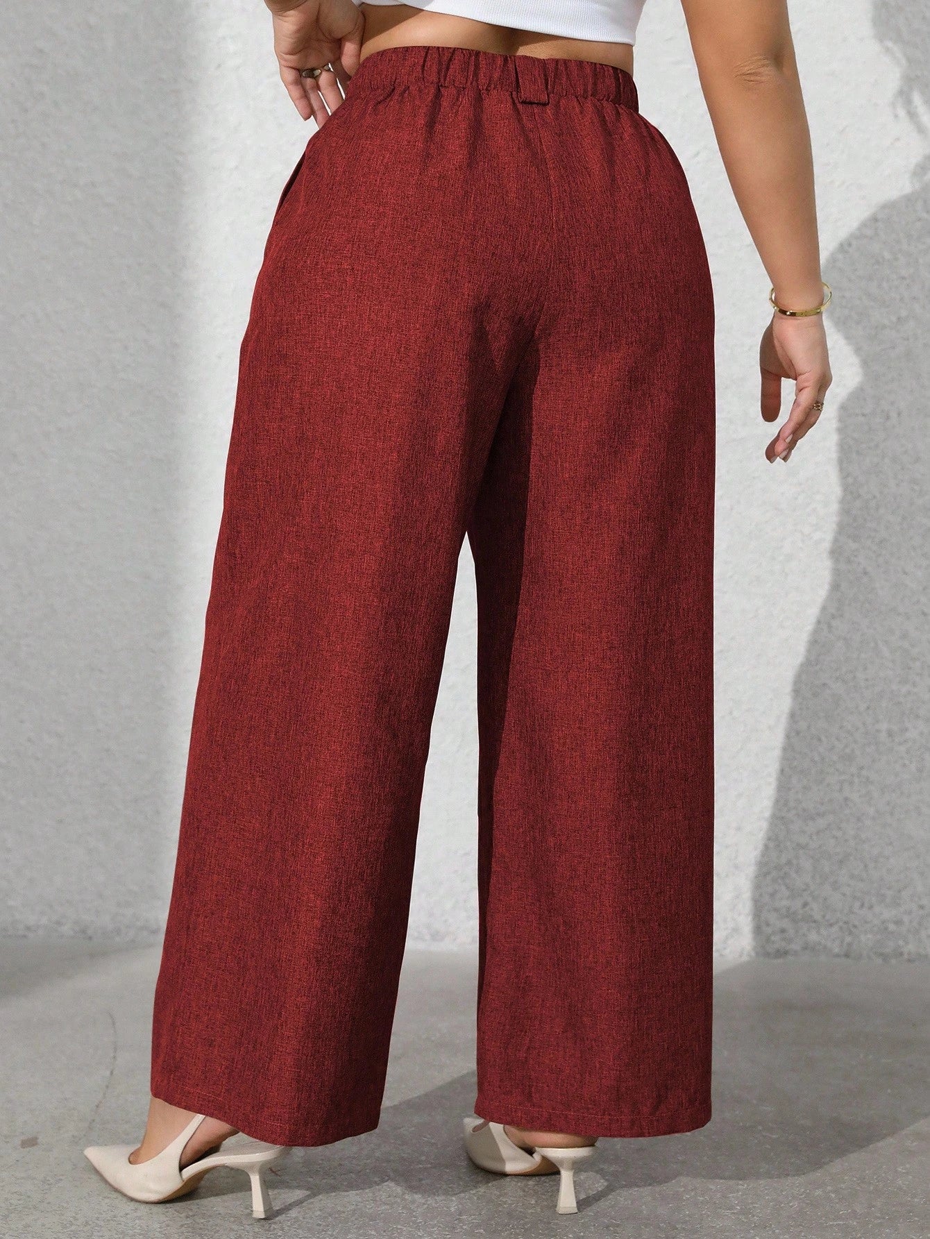 Calça feminina com falsos bolsos plus size Regina