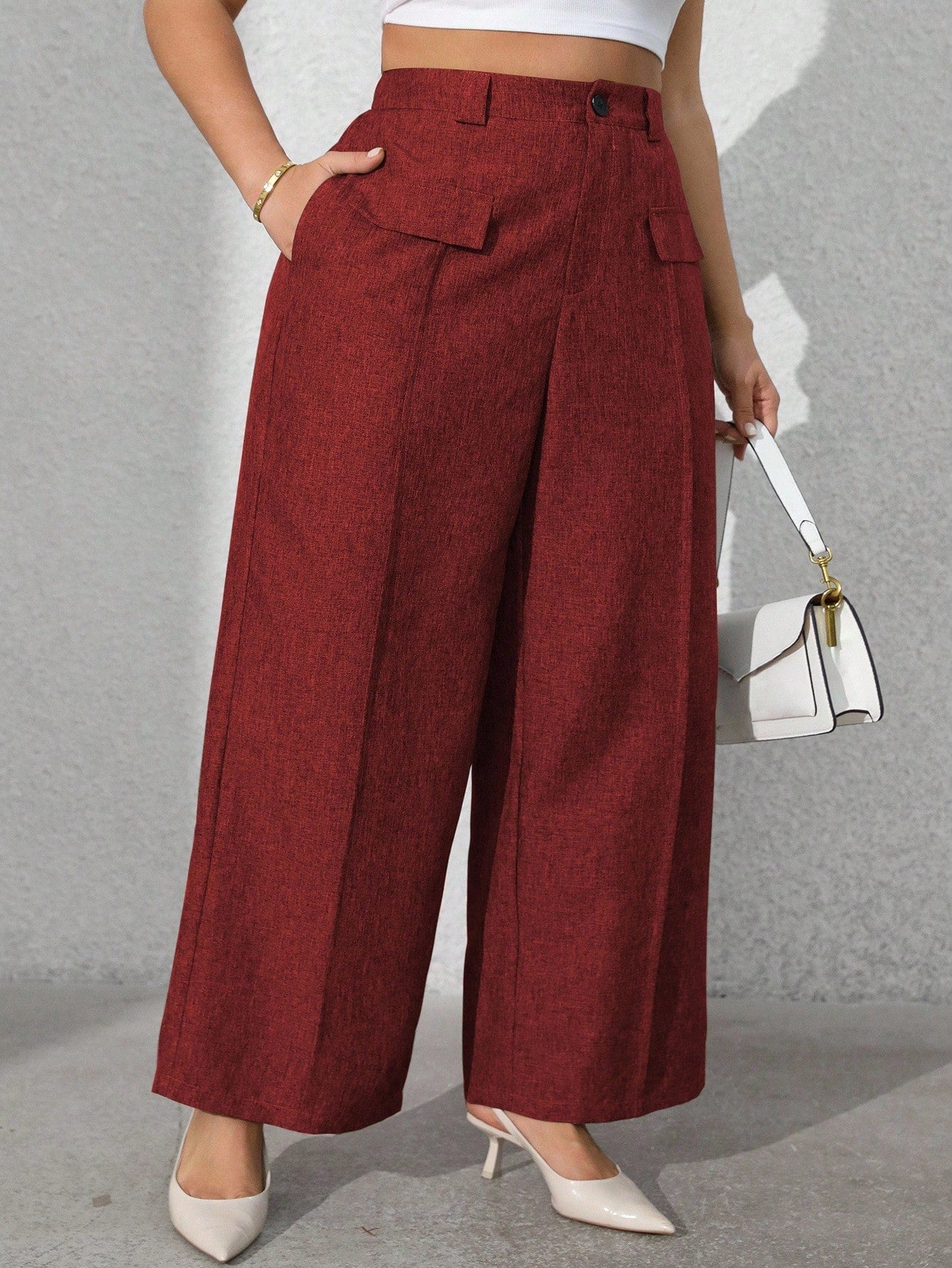Calça feminina com falsos bolsos plus size Regina