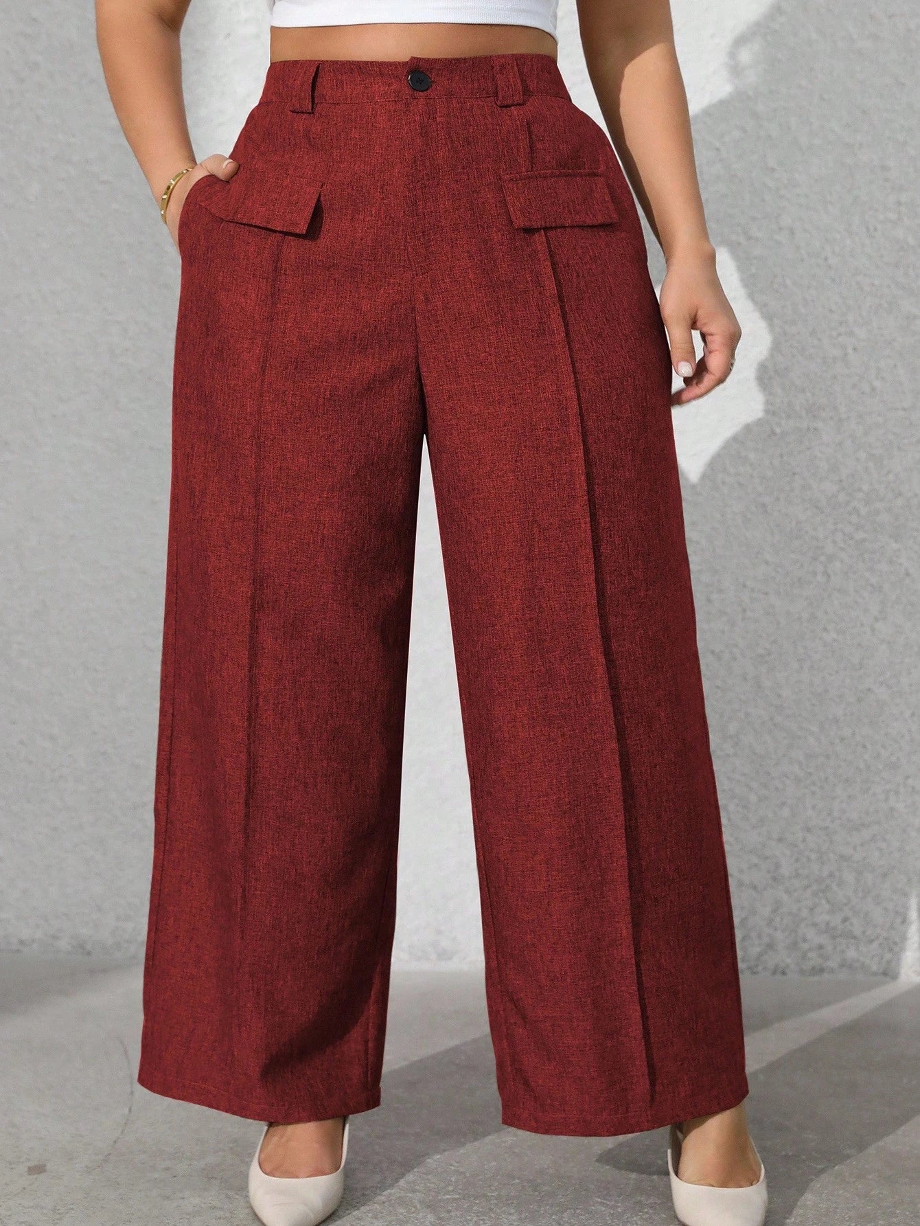 Calça feminina com falsos bolsos plus size Regina