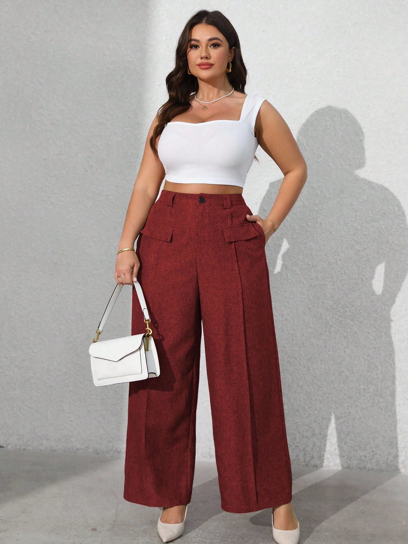 Calça feminina com falsos bolsos plus size Regina