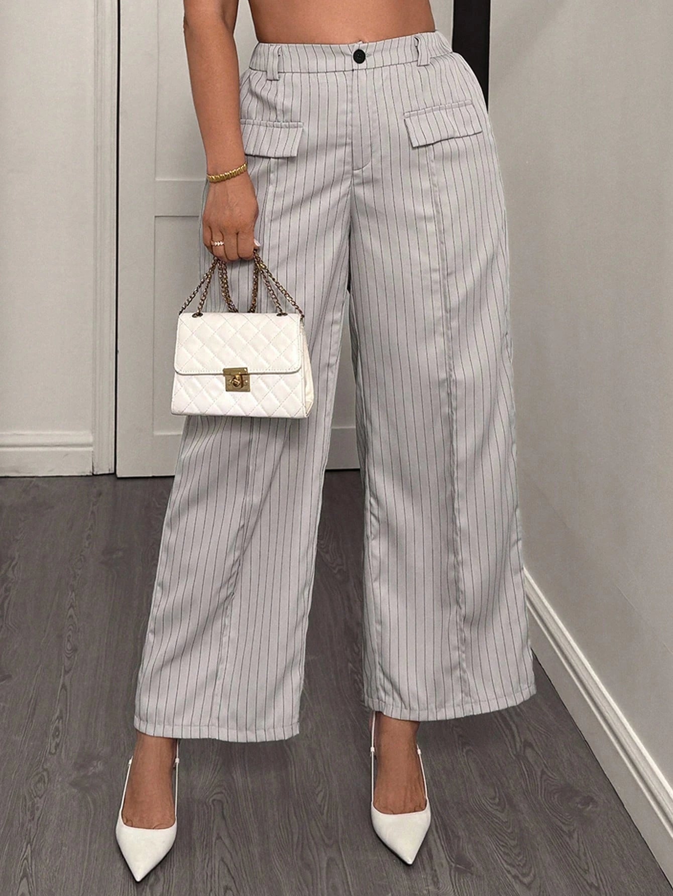Calça feminina com falsos bolsos plus size Regina