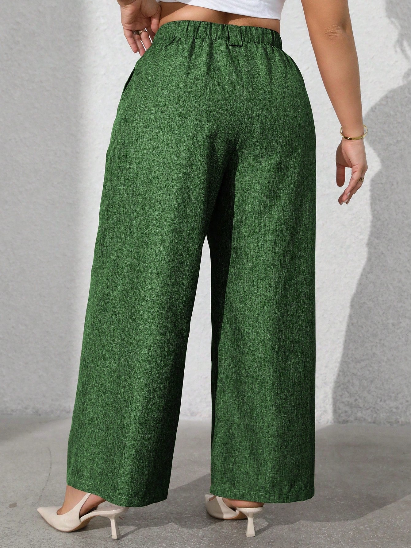 Calça feminina com falsos bolsos plus size Regina