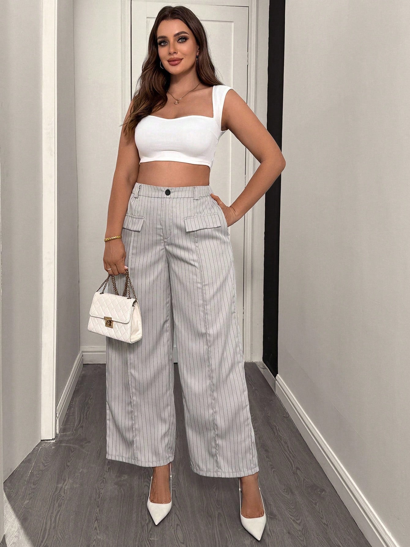 Calça feminina com falsos bolsos plus size Regina