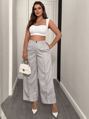 Calça feminina com falsos bolsos plus size Regina
