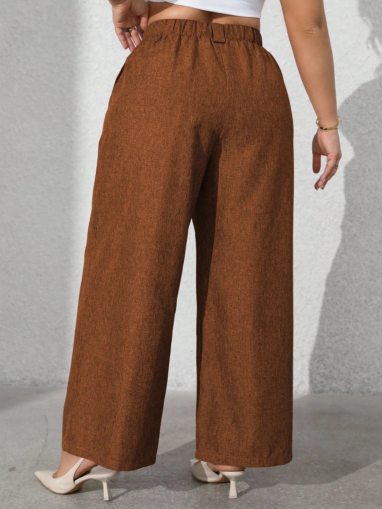 Calça feminina com falsos bolsos plus size Regina