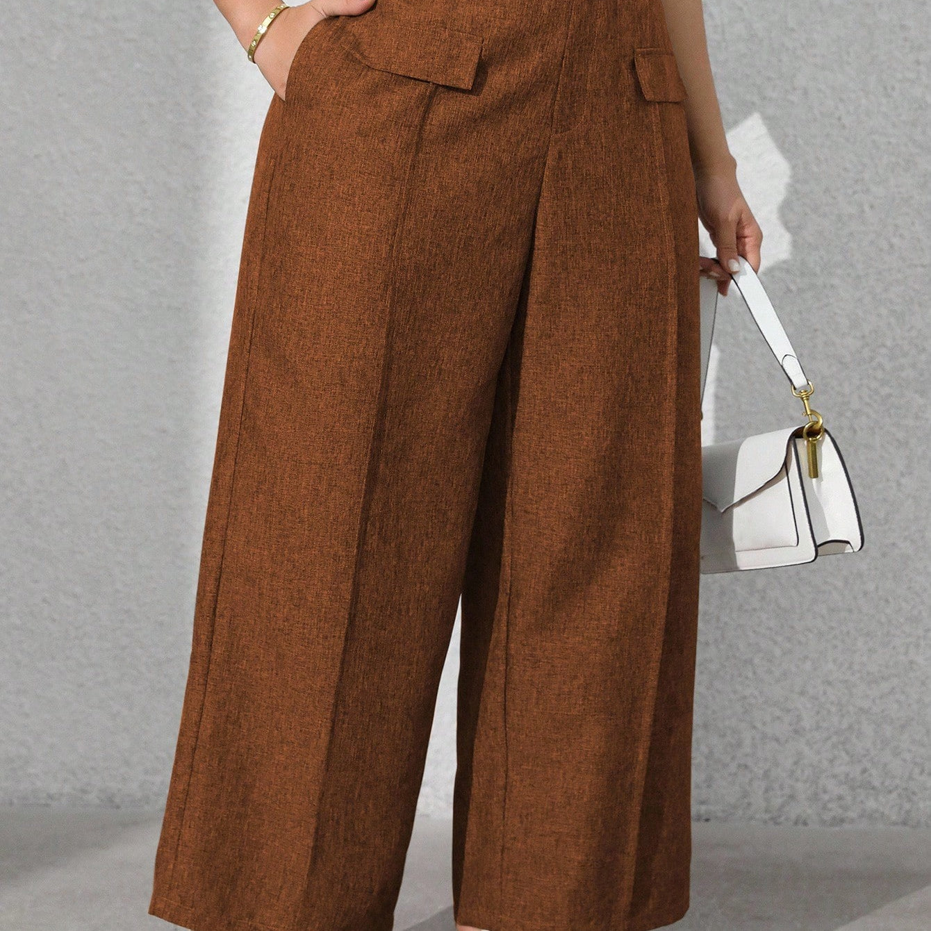 Calça feminina com falsos bolsos plus size Regina