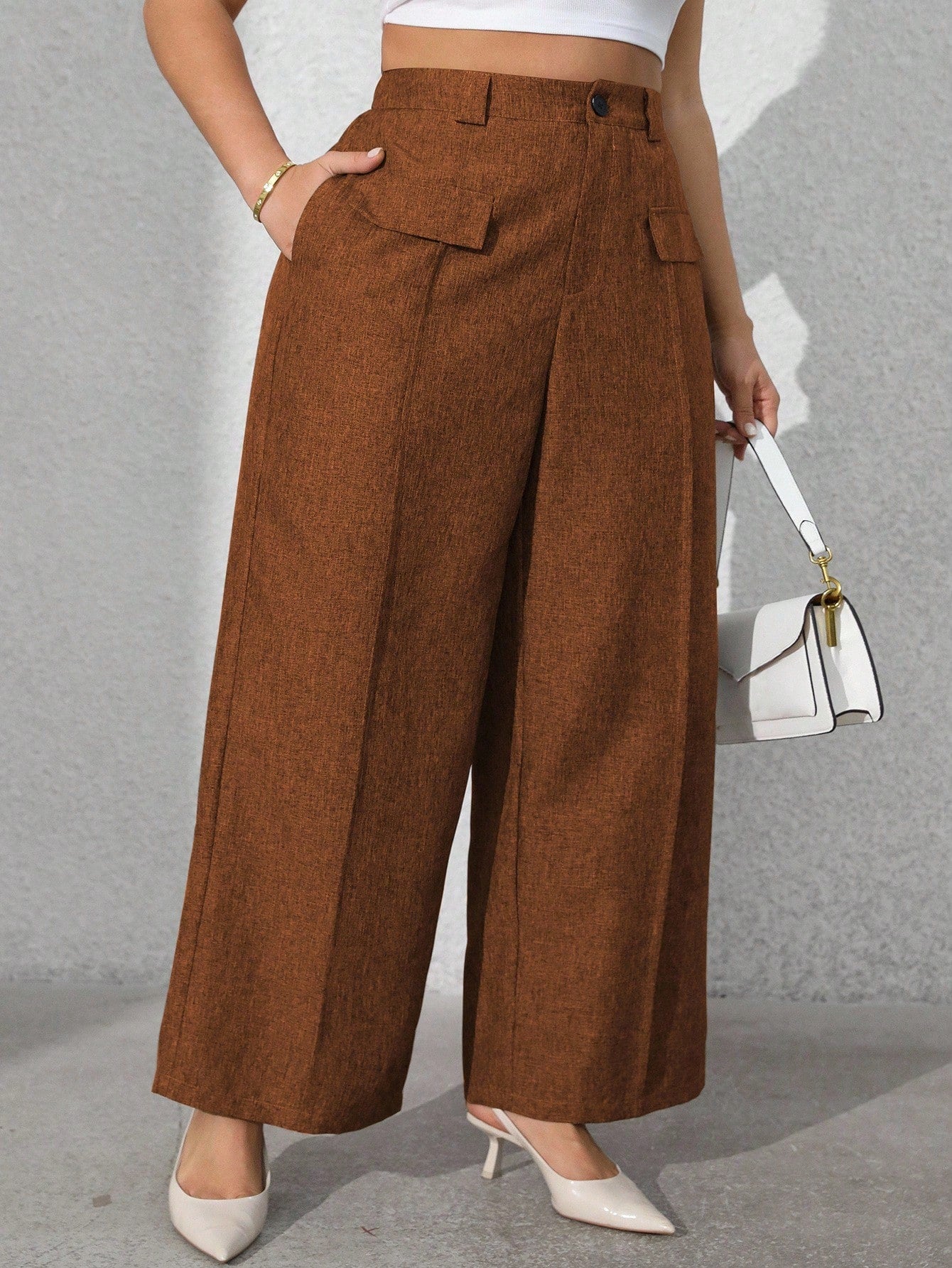 Calça feminina com falsos bolsos plus size Regina