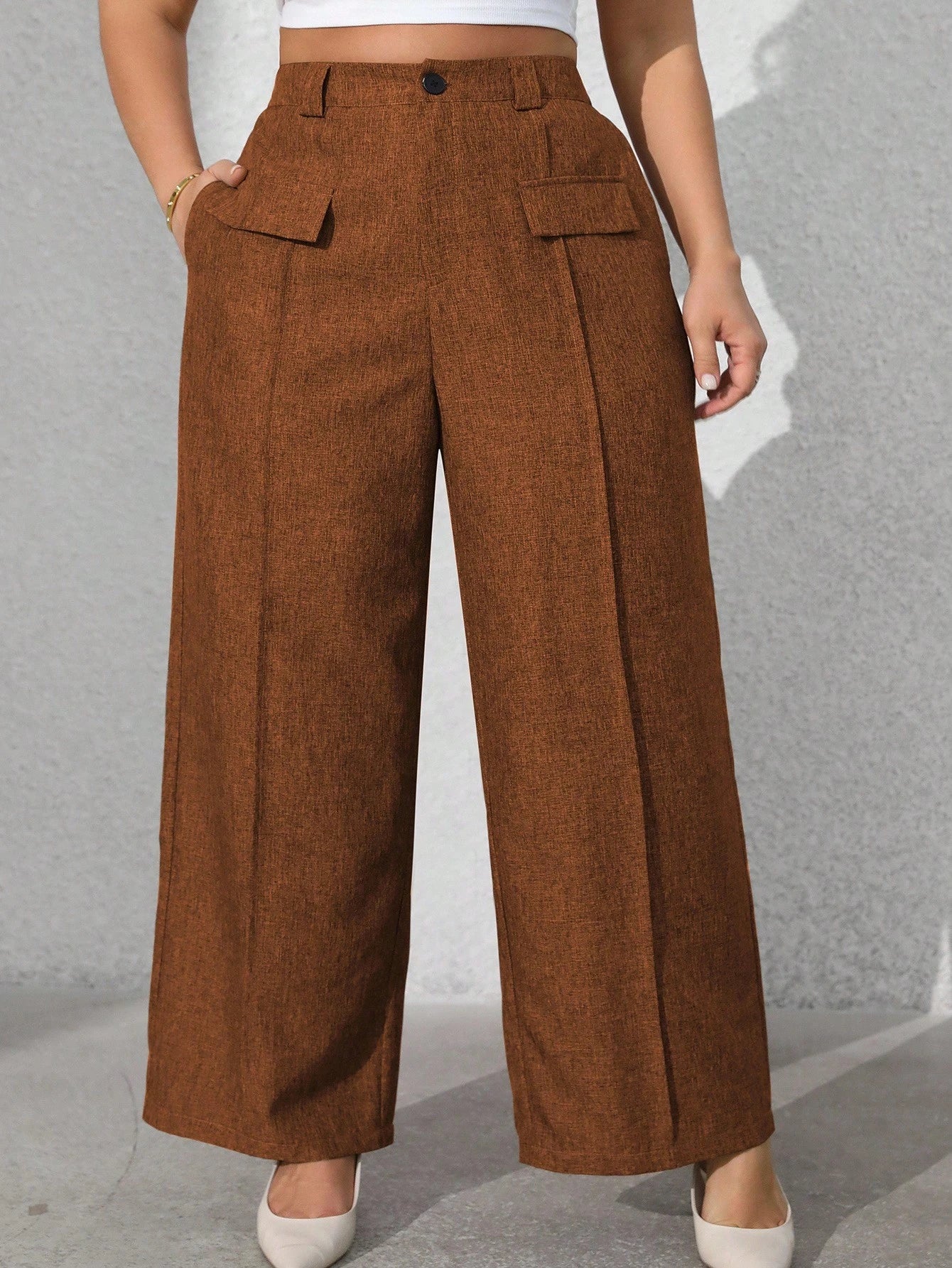 Calça feminina com falsos bolsos plus size Regina