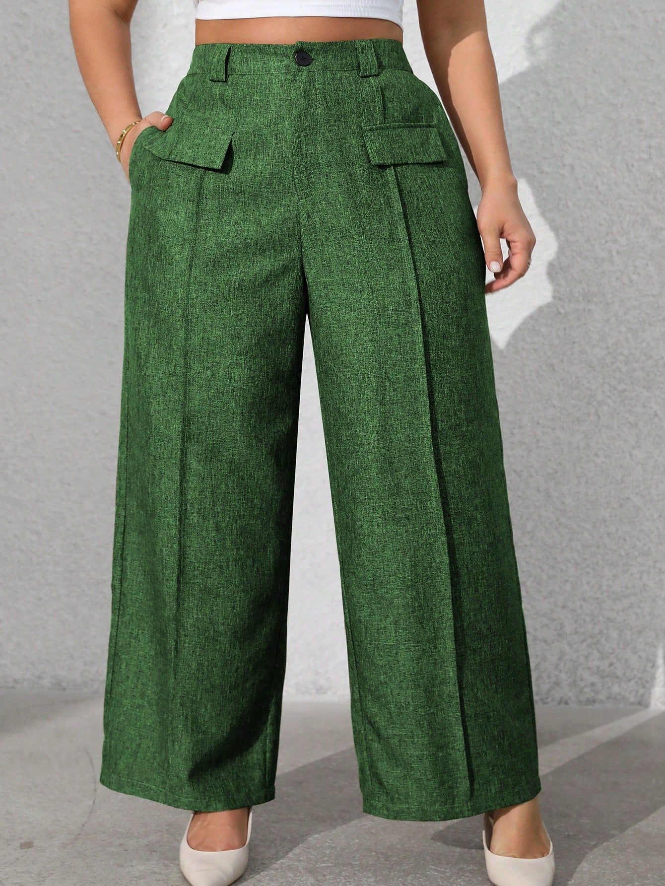 Calça feminina com falsos bolsos plus size Regina