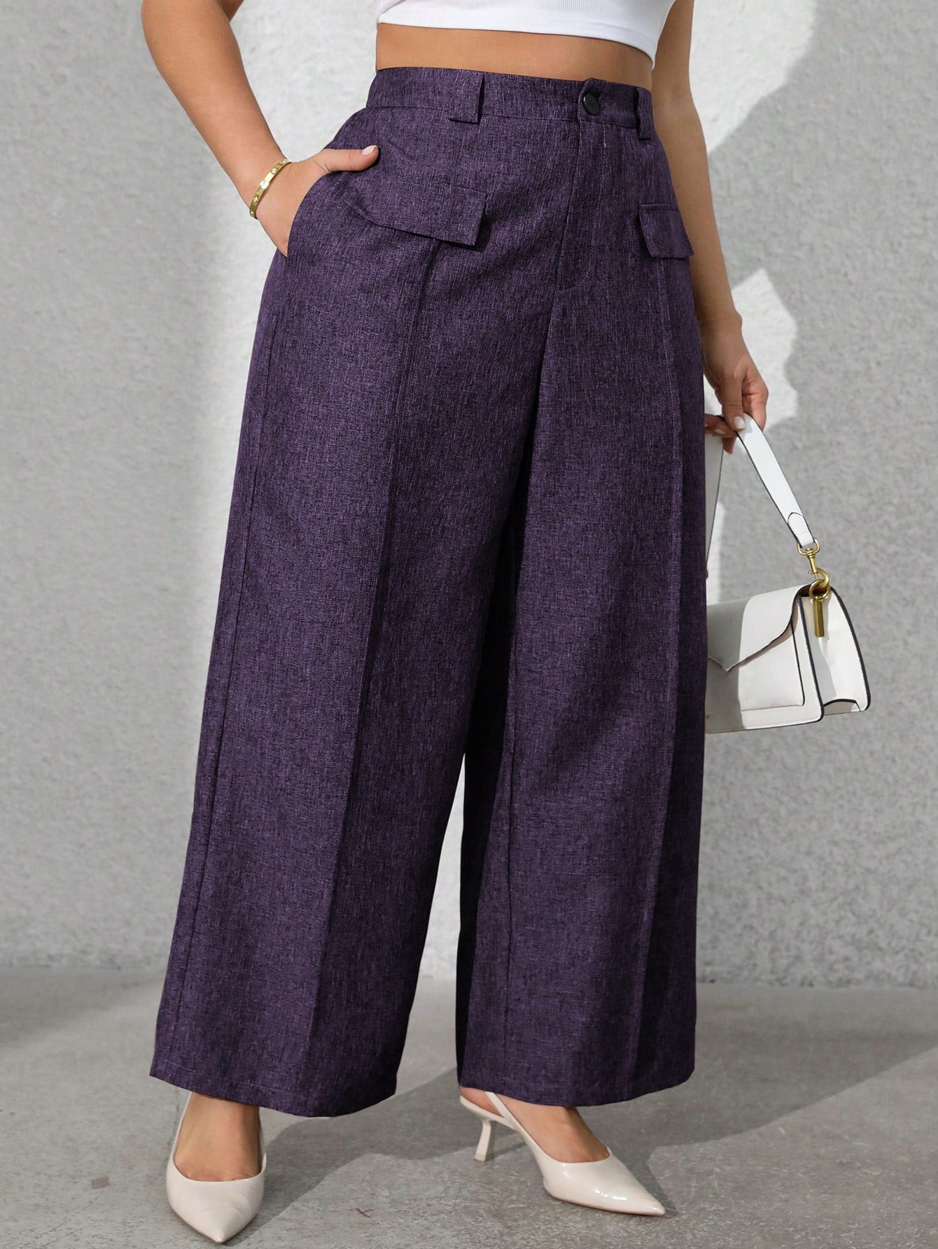 Calça feminina com falsos bolsos plus size Regina